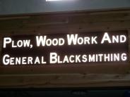 Plow, Wood Work and General Blacksmithing Sign