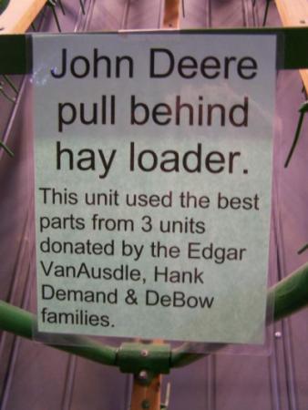 John Deere pull behind hay loader